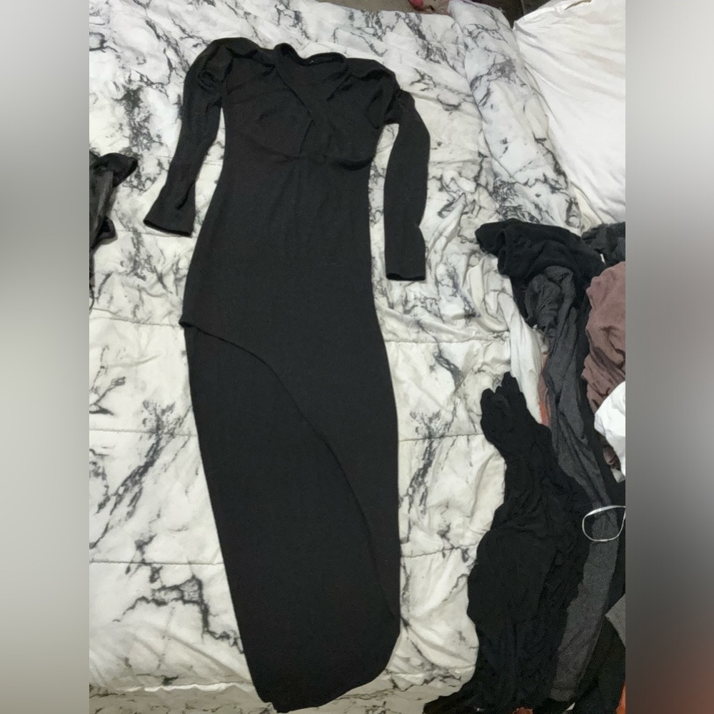 Win win asymmetrical cutout black maxi dress. Very sexy. Size S. Never worn